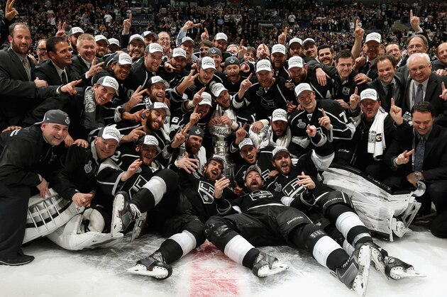 LOS ANGELES, CA - JUNE 13:  The Los Angeles Kings celebrate winning the Stanley Cup and Game Five 3-2 in double overtime over the New York Rangers in the 2014 Stanley Cup Final at the Staples Center on June 13, 2014 in Los Angeles, California. The Kings won the series 4-1.  (Photo by Dave Sandford/NHLI via Getty Images)