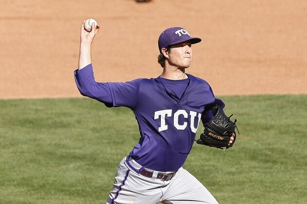 TCU pitcher Preston Morrison pitches in the eighth inning of a second-round game against TCU in the Big 12 conference NCAA college baseball tournament in Oklahoma City, Thursday, May 22, 2014. TCU won 6-2.  (AP Photo/Alonzo Adams)