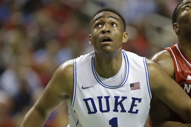 Duke's Jabari Parker (1) looks up for a rebound against North Carolina State during the first half of an NCAA college basketball game in the semifinals of the Atlantic Coast Conference tournament in Greensboro, N.C., Saturday, March 15, 2014. (AP Photo/Bob Leverone)