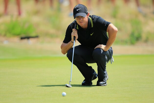 PINEHURST, NC - JUNE 14: Rory McIlroy of Northern Ireland lines up his putt on the fourth green during the third round of the 114th U.S. Open at Pinehurst Resort & Country Club, Course No. 2 on June 14, 2014 in Pinehurst, North Carolina.  (Photo by David Cannon/Getty Images)