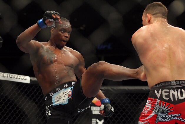 Apr 27, 2013; Newark, NJ, USA; Gian Villante ( red shorts) competes against Ovince St. Preux (black  shorts) during UFC 159 at the Prudential Center. Mandatory Credit: Brad Penner-USA TODAY Sports