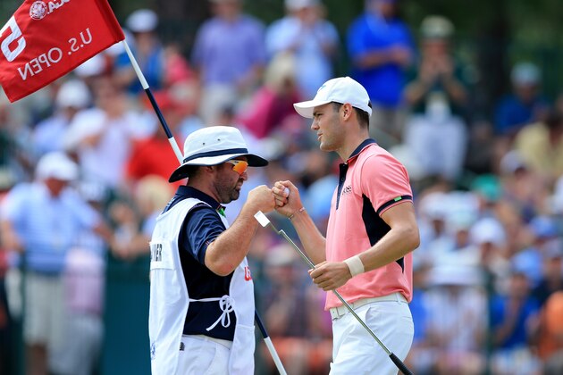 PINEHURST, NC - JUNE 14:  Martin Kaymer (R) of Germany celebrates an eagle on the fifth green with his caddie Craig Connelly (L) during the third round of the 114th U.S. Open at Pinehurst Resort & Country Club, Course No. 2 on June 14, 2014 in Pinehurst, North Carolina.  (Photo by David Cannon/Getty Images)