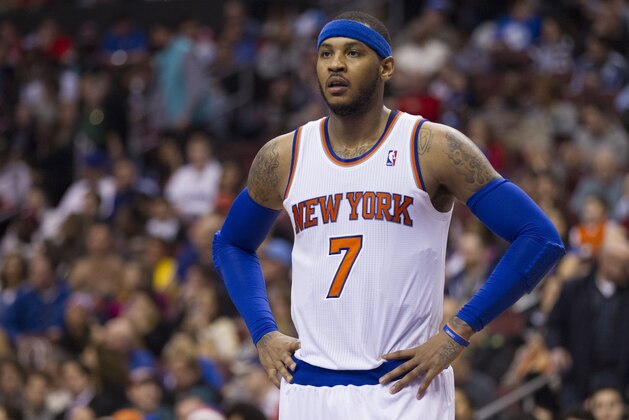 New York Knicks' Carmelo Anthony looks on during the second half of an NBA basketball game against the Philadelphia 76ers, Saturday, Jan. 11, 2014, in Philadelphia.  The Knicks win 102-92.  (AP Photo/Chris Szagola)