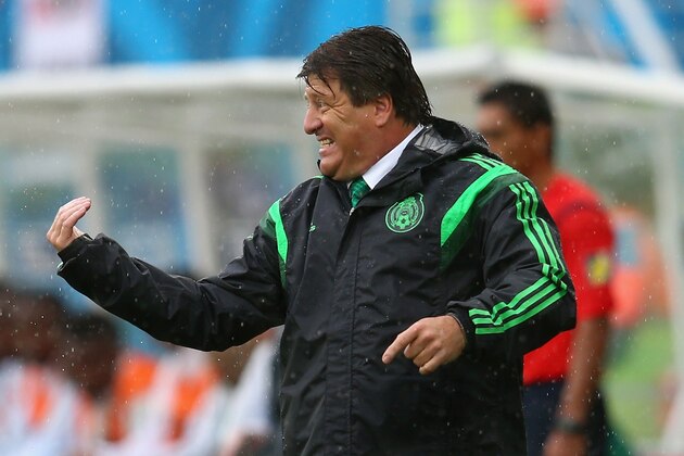 NATAL, BRAZIL - JUNE 13:  Heac coach Miguel Herrera of Mexico reacts during the 2014 FIFA World Cup Brazil Group A match between Mexico and Cameroon at Estadio das Dunas on June 13, 2014 in Natal, Brazil.  (Photo by Julian Finney/Getty Images)