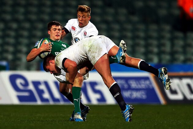 AUCKLAND, NEW ZEALAND - JUNE 15:  Howard Packman of England makes a big tackle on Garry Ringrose of Ireland during the 2014 Junior World Championship Semi Final match between England and Ireland at QBE Stadium on June 15, 2014 in Auckland, New Zealand.  (Photo by Anthony Au-Yeung/Getty Images)