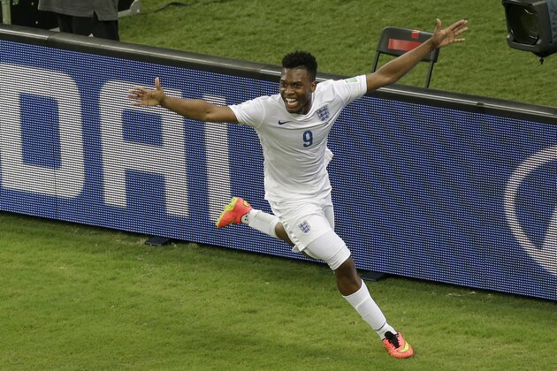England's Daniel Sturridge celebrates scoring his side's first goal during the group D World Cup soccer match between England and Italy at the Arena da Amazonia in Manaus, Brazil, Saturday, June 14, 2014.  (AP Photo/Themba Hadebe)
