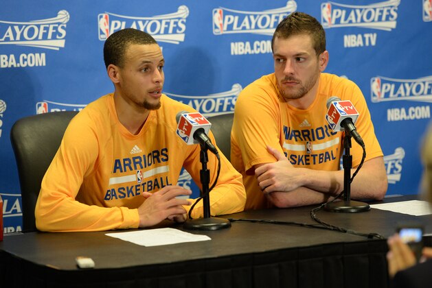 LOS ANGELES, CA - APRIL 19: Stephen Curry #30 and David Lee #10 of the Golden State Warriors speak to the media after Game One of the Western Conference Quarterfinals of the NBA Playoffs at STAPLES Center on April 19, 2014 in Los Angeles, California. NOTE TO USER: User expressly acknowledges and agrees that, by downloading and/or using this Photograph, user is consenting to the terms and conditions of the Getty Images License Agreement. Mandatory Copyright Notice: Copyright 2014 NBAE (Photo by Andrew D. Bernstein/NBAE via Getty Images)