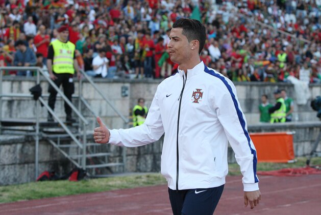 LISBON, PORTUGAL - MAY 31:  Cristiano Ronaldo of Portugal gestures before the International Friendly between Portugal and Greece at the National Stadium on May 31, 2014 in Lisbon, Portugal. (Photo by Gualter Fatia/Getty Images)