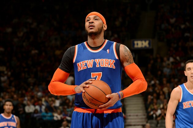 TORONTO, CANADA - April 11: Carmelo Anthony #7 of the New York Knicks attempts a free throw against the Toronto Raptors on April 11, 2014 at the Air Canada Centre in Toronto, Ontario, Canada.  NOTE TO USER: User expressly acknowledges and agrees that, by downloading and or using this Photograph, user is consenting to the terms and conditions of the Getty Images License Agreement.  Mandatory Copyright Notice: Copyright 2014 NBAE (Photo by Ron Turenne/NBAE via Getty Images)