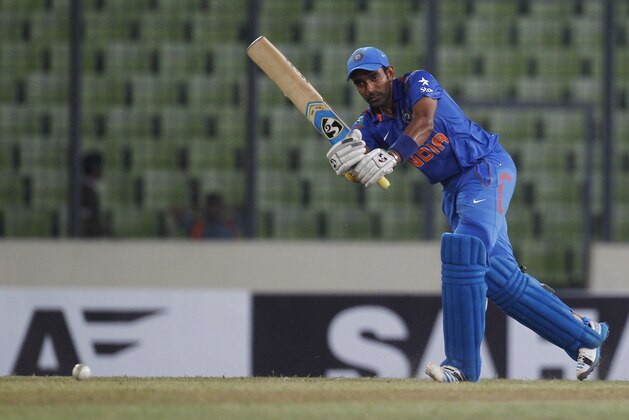 India's Robin Uthappa plays a shot during their first one-day International cricket match against Bangladesh in Dhaka, Bangladesh, Sunday, June 15, 2014. (AP Photo/A.M. Ahad)