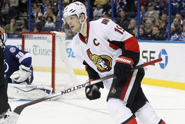 Mar 24, 2014; Tampa, FL, USA; Ottawa Senators center Jason Spezza (19) reacts after he scores the game winning shootout goal during the third period against the Tampa Bay Lightning at Tampa Bay Times Forum. Ottawa Senators defeated the Tampa Bay Lightning 4-3 in a shootout. Mandatory Credit: Kim Klement-USA TODAY Sports
