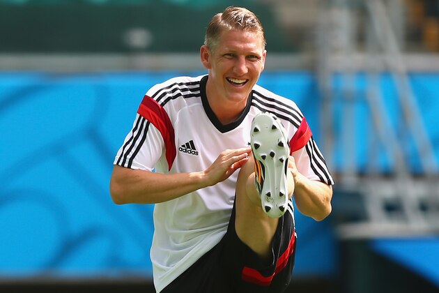 SALVADOR, BRAZIL - JUNE 15:  Bastian Schweinsteiger stretches during the Germany training session ahead of the 2014 FIFA World Cup Group G match between Germany and Portugal held at the Arena Fonte Nova on June 15, 2014 in Salvador, Brazil.  (Photo by Martin Rose/Getty Images)