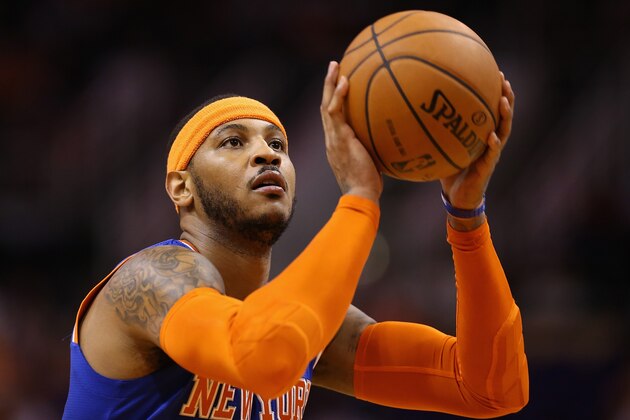 PHOENIX, AZ - MARCH 28:  Carmelo Anthony #7 of the New York Knicks shoots a free throw shot against the Phoenix Suns during the NBA game at US Airways Center on March 28, 2014 in Phoenix, Arizona.  The Suns defeated the Knicks 112-88. NOTE TO USER: User expressly acknowledges and agrees that, by downloading and or using this photograph, User is consenting to the terms and conditions of the Getty Images License Agreement.  (Photo by Christian Petersen/Getty Images)