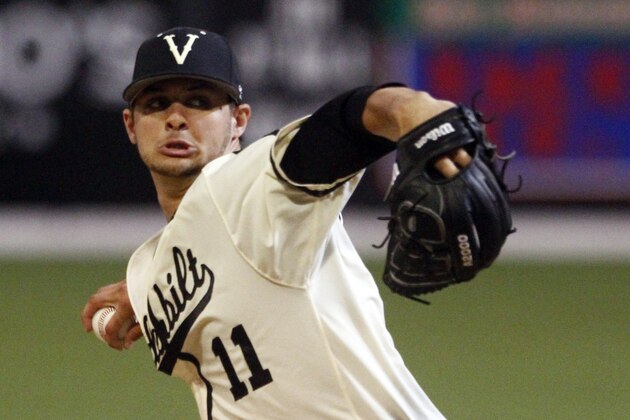 Vanderbilt pitcher Tyler Beede throws to an Illinois batter in the first inning of an NCAA college baseball tournament regional game Saturday, June 1, 2013, in Nashville, Tenn. (AP Photo/Wade Payne)