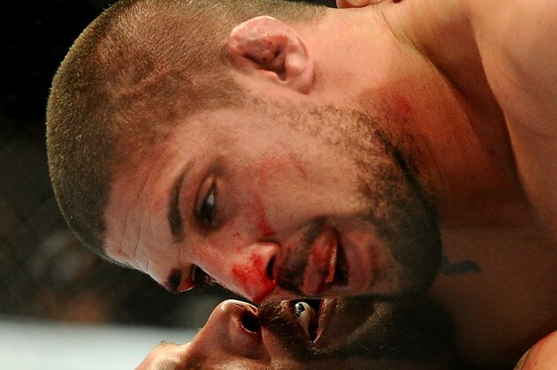 Feb 23, 2013; Anaheim, CA, USA;   Brendan Schaub (top) and Lavar Johnson (bottom) during their UFC heavyweight bout at the Honda Center. Mandatory Credit: Jayne Kamin-Oncea-USA TODAY Sports