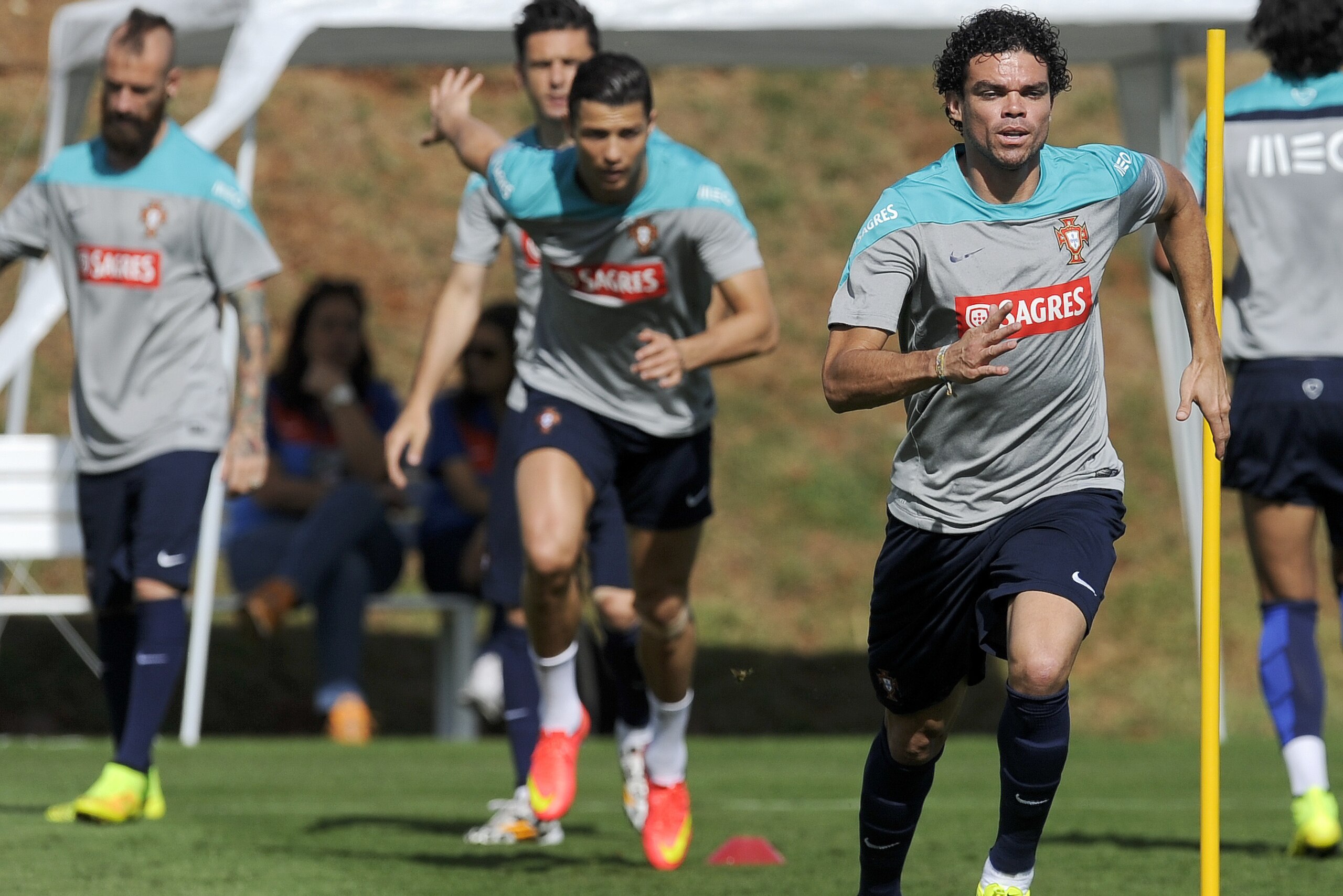 From right Portugal's Pepe, Cristiano Ronaldo, Helder Postiga and Raul Meireles practice during a training session of Portugal in Campinas, Brazil, Saturday, June 14, 2014. Portugal plays in group G of the Brazil 2014 soccer World Cup. (AP Photo/Paulo Duarte) From right Portugal's Pepe, Cristiano Ronaldo, Helder Postiga and Raul Meireles practice during a training session of Portugal in Campinas, Brazil, Saturday, June 14, 2014. Portugal plays in group G of the Brazil 2014 soccer World Cup. (AP Photo/Paulo Duarte)