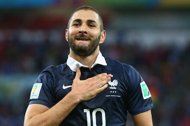 PORTO ALEGRE, BRAZIL - JUNE 15:  Karim Benzema of France celebrates after scoring his team's third goal during the 2014 FIFA World Cup Brazil Group E match between France and Honduras at Estadio Beira-Rio on June 15, 2014 in Porto Alegre, Brazil.  (Photo by Paul Gilham/Getty Images)