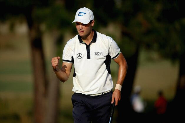 PINEHURST, NC - JUNE 15: Martin Kaymer of Germany celebrates his putt for birdie on the 13th green during the final round of the 114th U.S. Open at Pinehurst Resort & Country Club, Course No. 2 on June 15, 2014 in Pinehurst, North Carolina. (Photo by Andrew Redington/Getty Images) PINEHURST, NC - JUNE 15: Martin Kaymer of Germany celebrates his putt for birdie on the 13th green during the final round of the 114th U.S. Open at Pinehurst Resort & Country Club, Course No. 2 on June 15, 2014 in Pinehurst, North Carolina. (Photo by Andrew Redington/Getty Images)