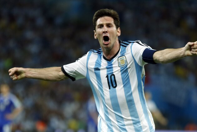 Argentina's Lionel Messi, centre, celebrates scoring his side's second goal during the group F World Cup soccer match between Argentina and Bosnia at the Maracana Stadium in Rio de Janeiro, Brazil, Sunday, June 15, 2014.   (AP Photo/Victor R. Caivano)