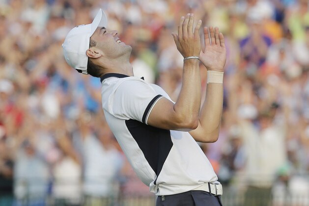Martin Kaymer, of Germany celebrates after winning the U.S. Open golf tournament in Pinehurst, N.C., Sunday, June 15, 2014.  (AP Photo/Eric Gay)
