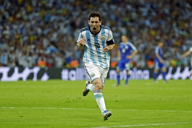 Argentina's Lionel Messi celebrates scoring his side's second goal during the group F World Cup soccer match between Argentina and Bosnia at the Maracana Stadium in Rio de Janeiro, Brazil, Sunday, June 15, 2014.     (AP Photo/Victor R. Caivano)