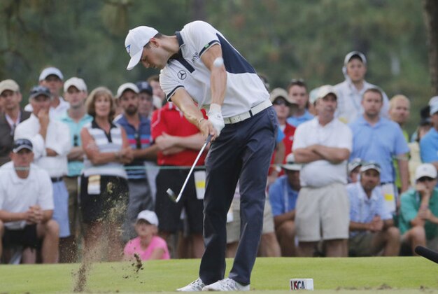 Martin Kaymer, of Germany, hits his tee shot on the 17th hole during the final round of the U.S. Open golf tournament in Pinehurst, N.C., Sunday, June 15, 2014. (AP Photo/Matt York)