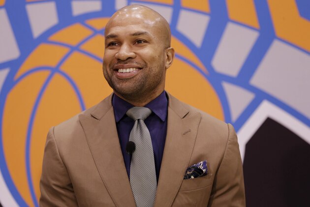 Derek Fisher participates in a news conference in Tarrytown, N.Y., Tuesday, June 10, 2014. The New York Knicks hired Fisher as their new coach on Tuesday, with Phil Jackson turning to one of his trustiest former players. (AP Photo/Seth Wenig)
