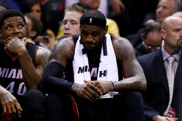 SAN ANTONIO, TX - JUNE 15:  LeBron James #6 of the Miami Heat reacts on the bench against the San Antonio Spurs during Game Five of the 2014 NBA Finals at the AT&T Center on June 15, 2014 in San Antonio, Texas. NOTE TO USER: User expressly acknowledges and agrees that, by downloading and or using this photograph, User is consenting to the terms and conditions of the Getty Images License Agreement.  (Photo by Andy Lyons/Getty Images)