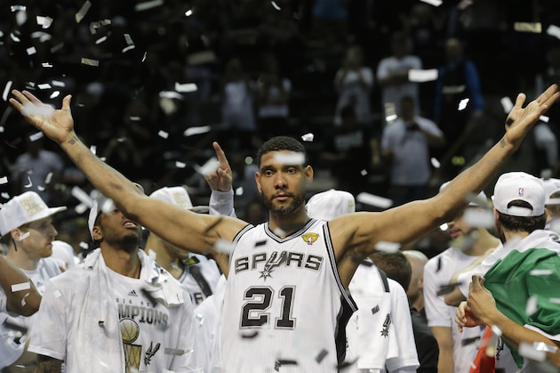 San Antonio Spurs forward Tim Duncan (21) celebrates after Game 5 of the NBA basketball finals on Sunday, June 15, 2014, in San Antonio. The Spurs won the NBA championship 104-87. (AP Photo/David J. Phillip)