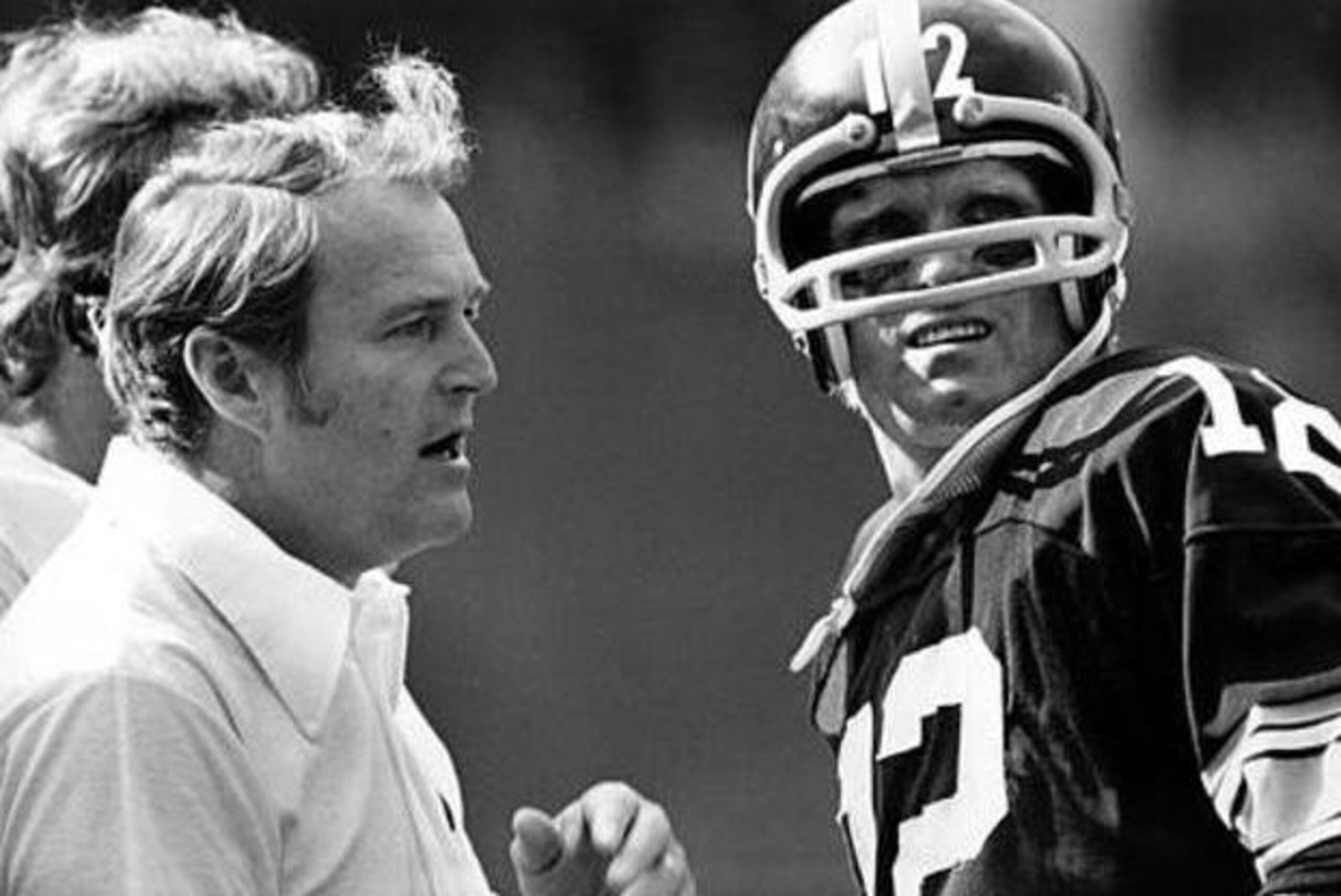 Pittsburgh Steelers quarterback Terry Bradshaw, right, looks toward the clock as he confers with coach Chuck Noll on the sideline, during time out in a game between the Steelers and the Cleveland Brewers, September 19, 1976, in Pittsburgh. (AP Photo) Pittsburgh Steelers quarterback Terry Bradshaw, right, looks toward the clock as he confers with coach Chuck Noll on the sideline, during time out in a game between the Steelers and the Cleveland Brewers, September 19, 1976, in Pittsburgh. (AP Photo)