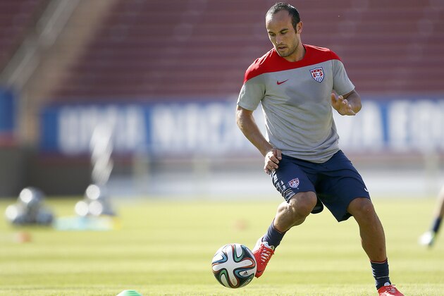 United States' Landon Donovan, controls the ball during a training session  on Wednesday, May 14, 2014, Stanford, Calif.  The US national soccer team kicked off its preparation camp at Stanford University preparing for the World Cup tournament, which gets underway in June. (AP Photo/Tony Avelar)