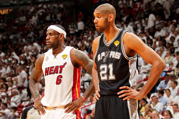 MIAMI, FL - JUNE 6: Tim Duncan #21 of the San Antonio Spurs and LeBron James #6 of the Miami Heat wait to resume play during Game One of the 2013 NBA Finals on June 6, 2013 at American Airlines Arena in Miami, Florida. NOTE TO USER: User expressly acknowledges and agrees that, by downloading and or using this photograph, User is consenting to the terms and conditions of the Getty Images License Agreement. Mandatory Copyright Notice: Copyright 2013 NBAE (Photo by Issac Baldizon/NBAE via Getty Images)