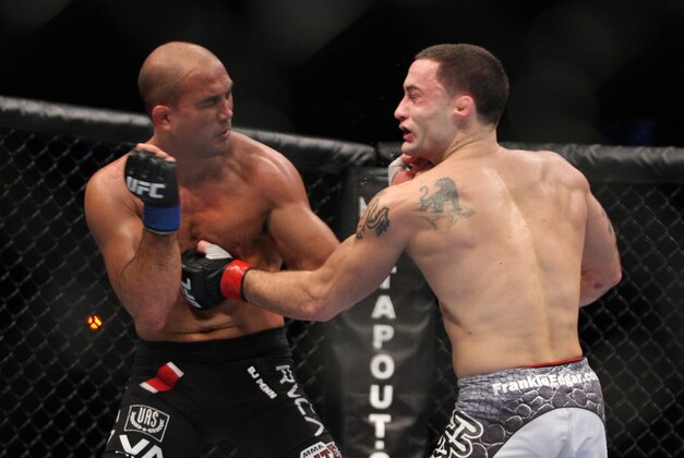 Frankie Edgar, right, in action against BJ Penn during their UFC fight at the TD Garden on Saturday, August 28, 2010 in Boston, MA. Edgar retained his UFC lightweight title via unanimous decision. (AP Photo/Gregory Payan)