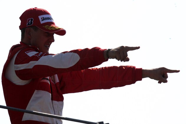 MONZA, ITALY - SEPTEMBER 10:  Michael Schumacher of Germany and Ferrari celebrates his win during the Italian Grand Prix at the Autodromo Nazionale di Monza on September 10, 2006, in Monza, Italy.  (Photo by Mark Thompson/Getty Images)