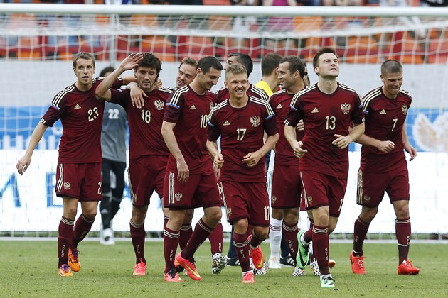 Russian national soccer team players celebrate a goal during a friendly soccer match against Morocco in Moscow, Russia, Friday, June 6, 2014. Russia won 2-0. This is the last friendly match before Russia team leave for Brazil to compete in the World Cup. (AP Photo/\Name\)