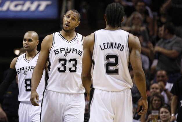 May 8, 2014; San Antonio, TX, USA; San Antonio Spurs forward Kawhi Leonard (2) celebrates a score with forward Boris Diaw (33) against the Portland Trail Blazers in game two of the second round of the 2014 NBA Playoffs at AT&T Center. Mandatory Credit: Soobum Im-USA TODAY Sports
