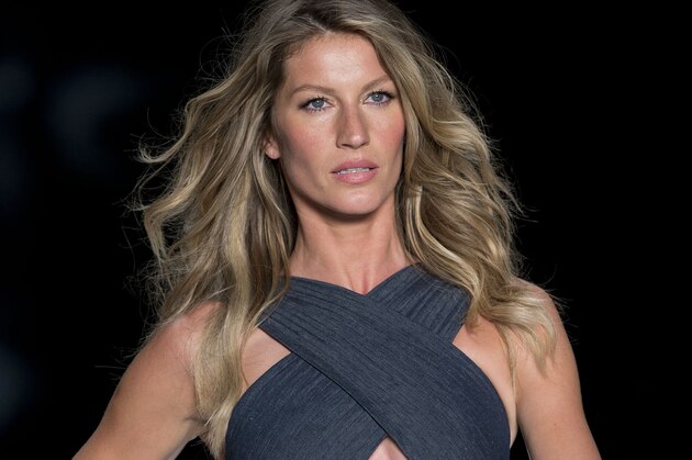 Brazil's model Gisele Bundchen wears a creation from the Colcci Summer collection during Sao Paulo Fashion Week in Sao Paulo, Brazil, Wednesday, April 2, 2014. (AP Photo/Andre Penner)