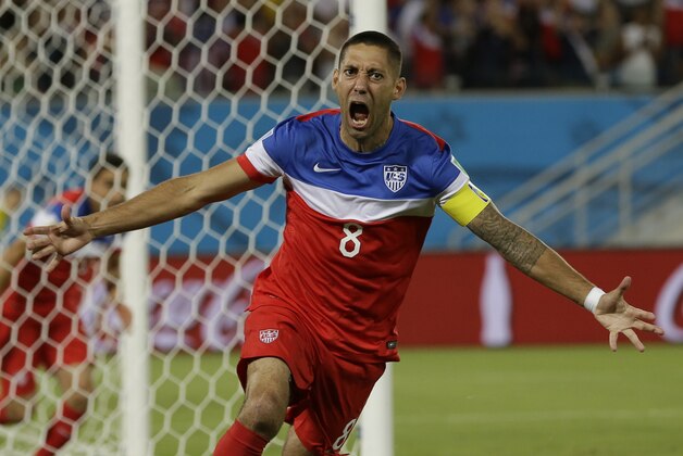 United States' Clint Dempsey celebrates after scoring the opening goal during the group G World Cup soccer match between Ghana and the United States at the Arena das Dunas in Natal, Brazil, Monday, June 16, 2014.  (AP Photo/Ricardo Mazalan)