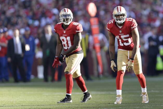 San Francisco 49ers wide receiver Anquan Boldin (81) and wide receiver Michael Crabtree (15) against the St. Louis Rams during the second half of an NFL football game in San Francisco, Sunday, Dec. 1, 2013. (AP Photo/Marcio Jose Sanchez)