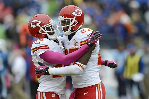 Kansas City Chiefs cornerbacks Brandon Flowers (24) and Sean Smith (27) celebrate after Flowers broke up a pass intended for Tennessee Titans wide receiver Kendall Wright late in the fourth quarter of an NFL football game on Sunday, Oct. 6, 2013, in Nashville, Tenn. Chiefs defensive back Quintin Demps intercepted the deflected pass on the play. (AP Photo/Mark Zaleski)