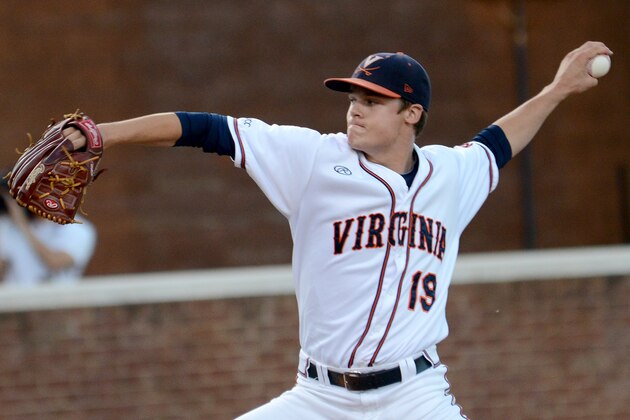Virginia's Nathan Kirby pitches during the first inning of an NCAA college baseball regional tournament game against Arkansas in Charlottesville, Va., Saturday, May 31, 2014. (AP Photo/Pat Jarrett)