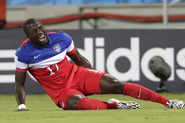 United States' Jozy Altidore grimaces after pulling up injured during the group G World Cup soccer match between Ghana and the United States at the Arena das Dunas in Natal, Brazil, Monday, June 16, 2014.  (AP Photo/Dolores Ochoa)