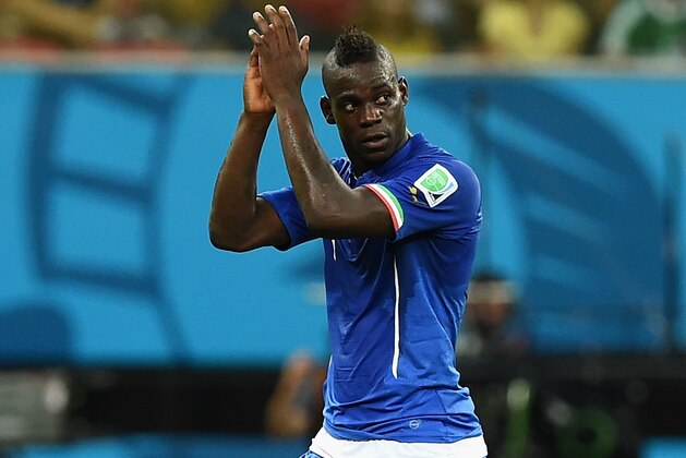 MANAUS, BRAZIL - JUNE 14:  Mario Balotelli of Italy acknowledges the fans after Italy defeated England 2-1 in the 2014 FIFA World Cup Brazil Group D match between England and Italy at Arena Amazonia on June 14, 2014 in Manaus, Brazil.  (Photo by Claudio Villa/Getty Images)