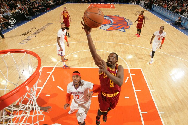 NEW YORK, NY - MARCH 23: Luol Deng #9 of the Cleveland Cavaliers goes up for a shot against the New York Knicks during a game at Madison Square Garden in New York City. NOTE TO USER: User expressly acknowledges and agrees that, by downloading and or using this photograph, User is consenting to the terms and conditions of the Getty Images License Agreement. Mandatory Copyright Notice: Copyright 2014 NBAE (Photo by Nathaniel S. Butler/NBAE via Getty Images)