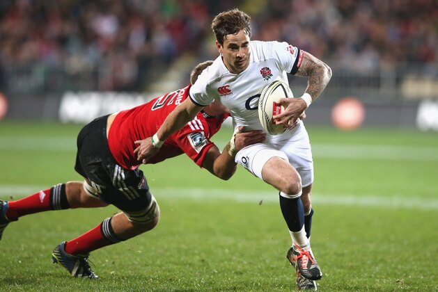 CHRISTCHURCH, NEW ZEALAND - JUNE 17:  Danny Cipriani of England breaks past Joel Everson during the match between the Crusaders and England at the AMI Stadium on June 17, 2014 in Christchurch, New Zealand.  (Photo by David Rogers/Getty Images)