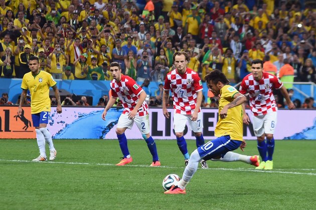 SAO PAULO, BRAZIL - JUNE 12:  Neymar of Brazil takes a penalty kick during the 2014 FIFA World Cup Brazil Group A match between Brazil and Croatia at Arena de Sao Paulo on June 12, 2014 in Sao Paulo, Brazil.  (Photo by Buda Mendes/Getty Images)