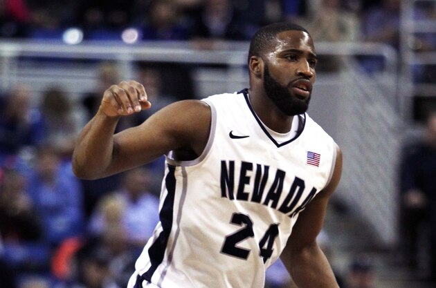 Jan 14, 2014; Reno, NV, USA; Nevada Wolf Pack guard Deonte Burton (24) calls out a play during their NCAA basketball game with the Boise State Broncos at Lawlor Events Center. Mandatory Credit: Lance Iversen-USA TODAY Sports. Boise State won 74-65.