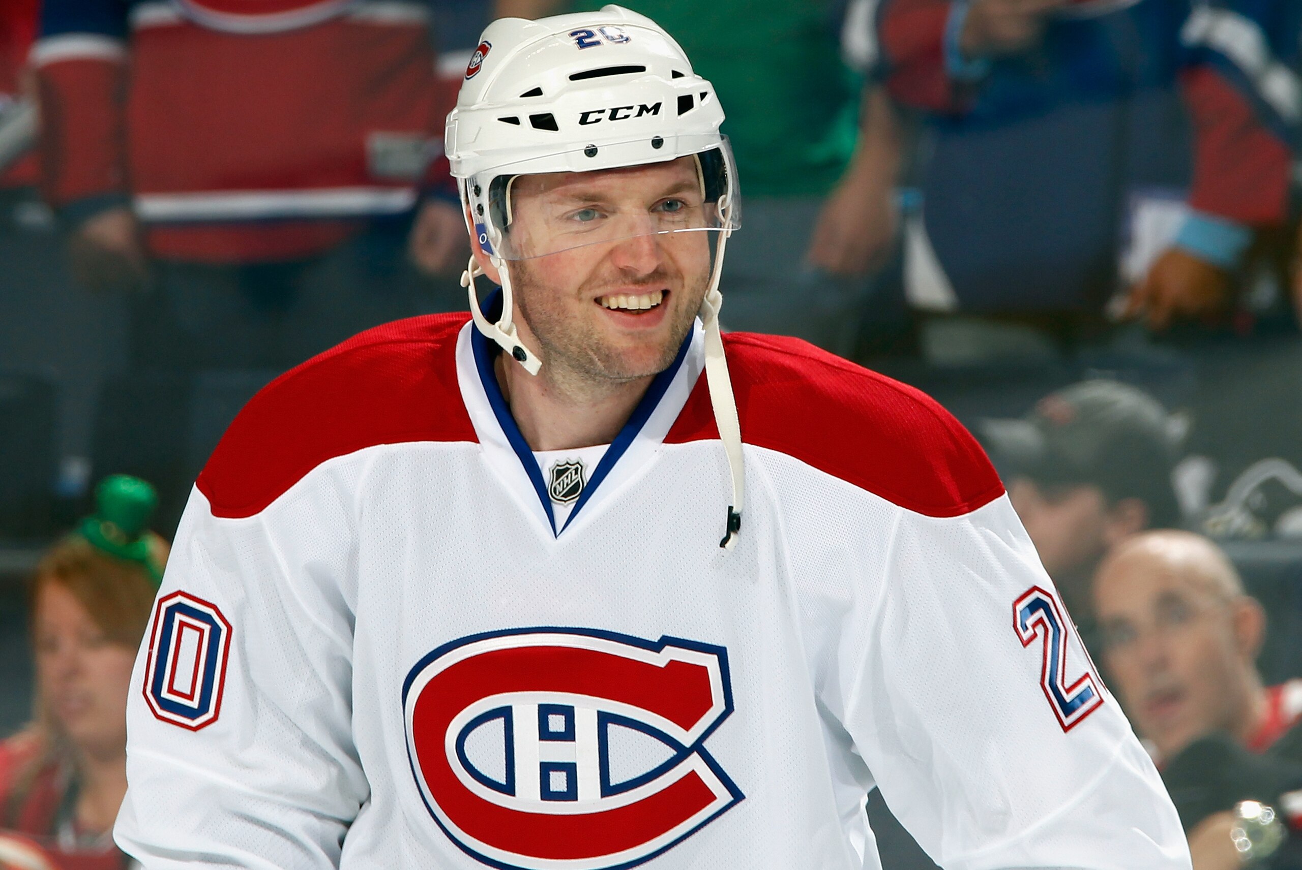 BUFFALO, NY - MARCH 16:  Thomas Vanek #20 of the Montreal Canadiens jokes with former Buffalo Sabres teammates as he warms up to play at First Niagara Center on March 16, 2014 in Buffalo, New York.  (Photo by Jen Fuller/Getty Images)