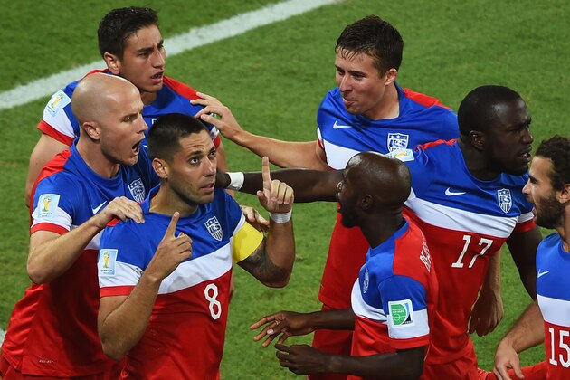 NATAL, BRAZIL - JUNE 16:  Clint Dempsey of the United States celebrates with teammates after scoring his team's first goal during the 2014 FIFA World Cup Brazil Group G match between Ghana and the United States at Estadio das Dunas on June 16, 2014 in Natal, Brazil.  (Photo by Laurence Griffiths/Getty Images)