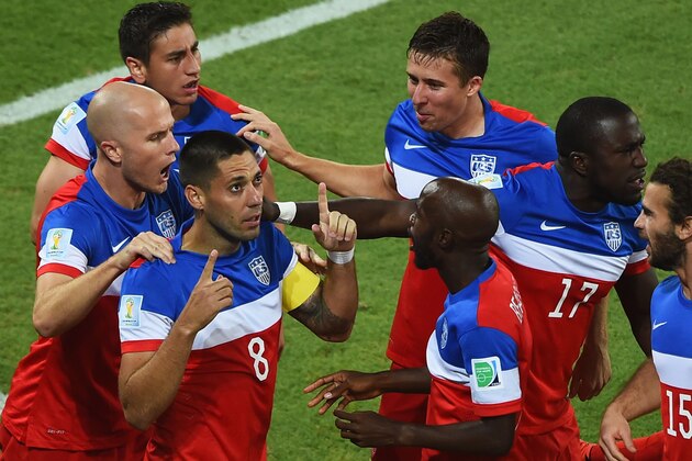 NATAL, BRAZIL - JUNE 16:  Clint Dempsey of the United States celebrates with teammates after scoring his team's first goal during the 2014 FIFA World Cup Brazil Group G match between Ghana and the United States at Estadio das Dunas on June 16, 2014 in Natal, Brazil.  (Photo by Laurence Griffiths/Getty Images)